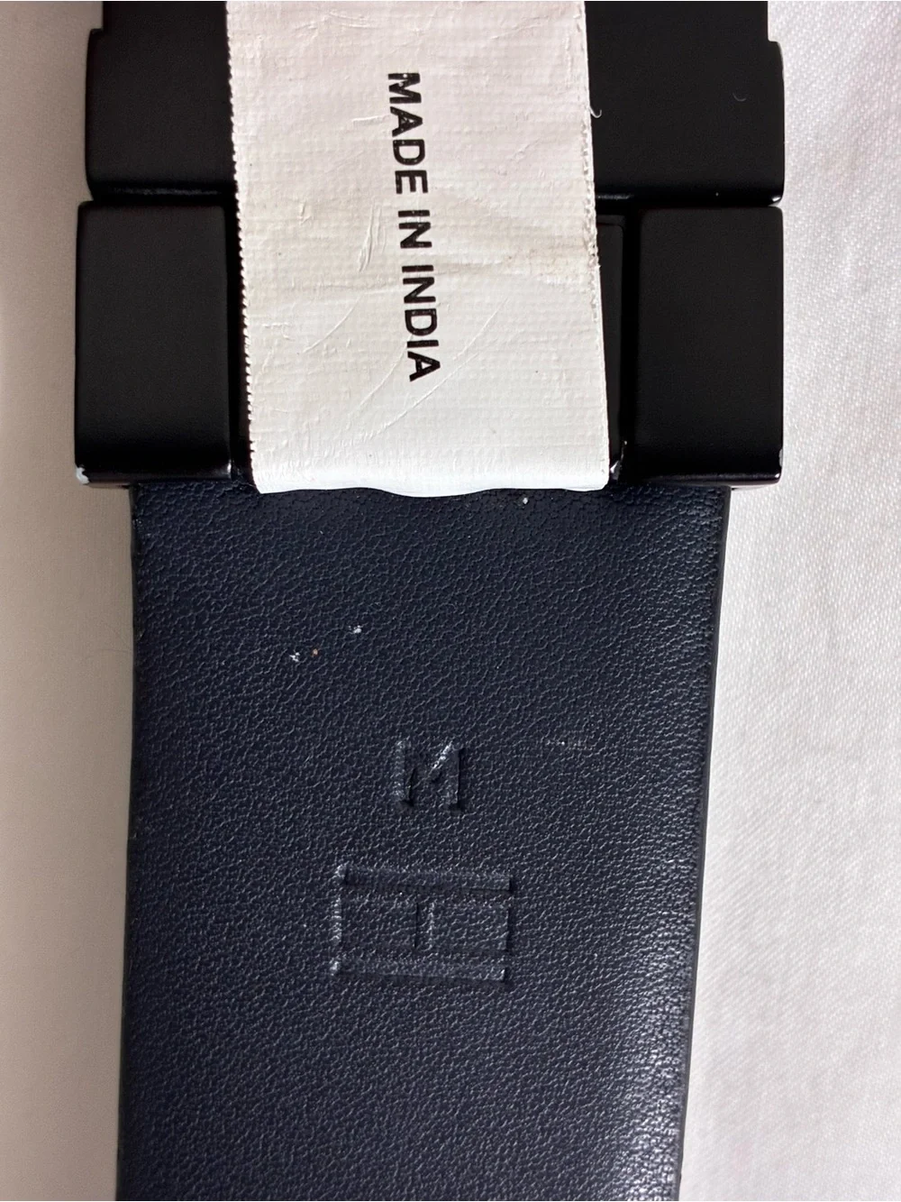 Tommy Hilfiger men’s belt 42” Black Textured Leather with Signature Stripe